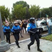 Riot Police move in.